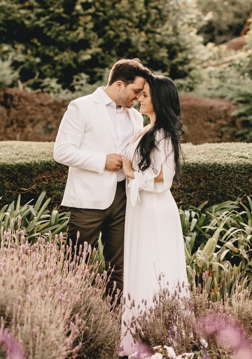 Couple standing together in a lavender garden